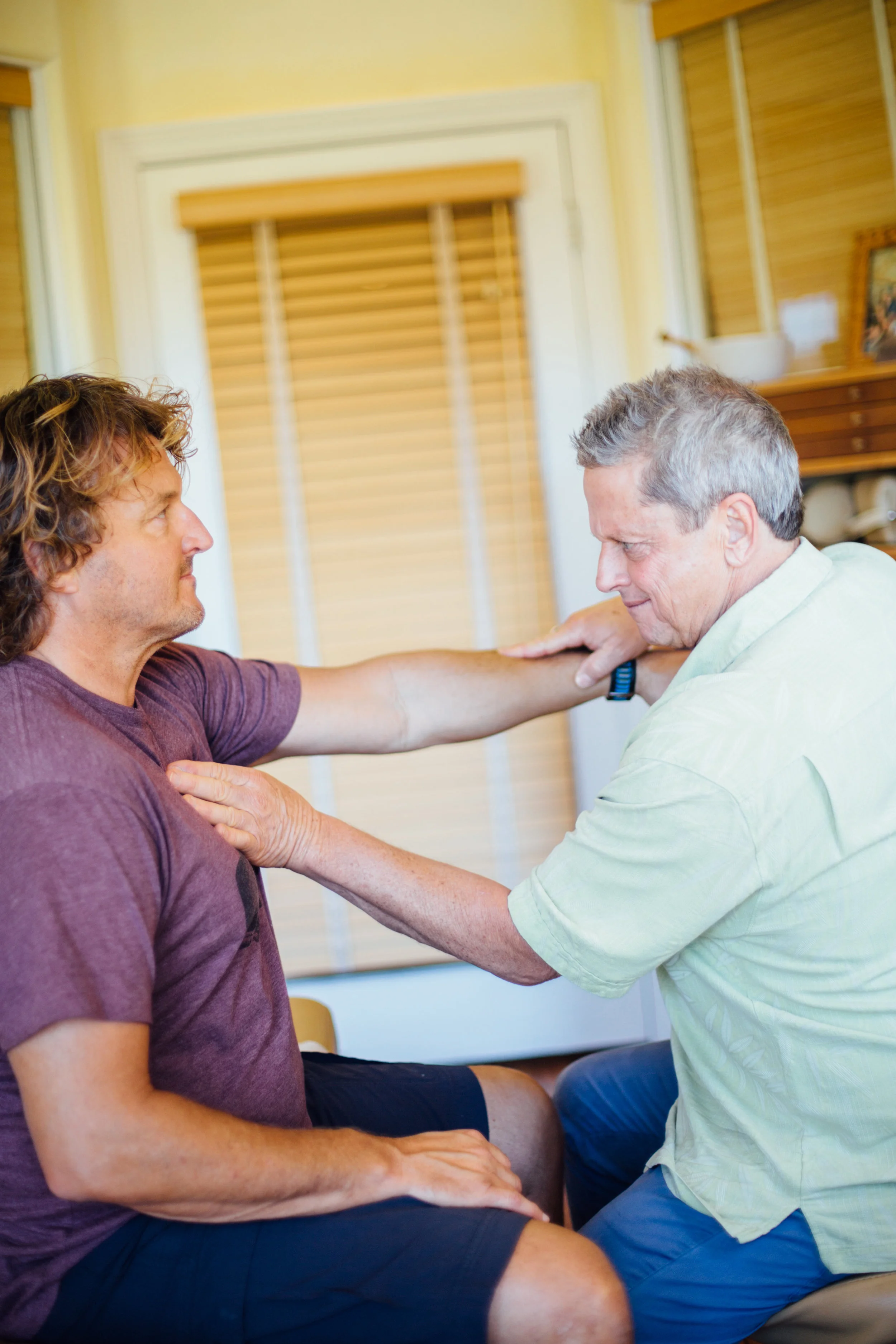 Dr. G and Tom- muscle testing.jpg