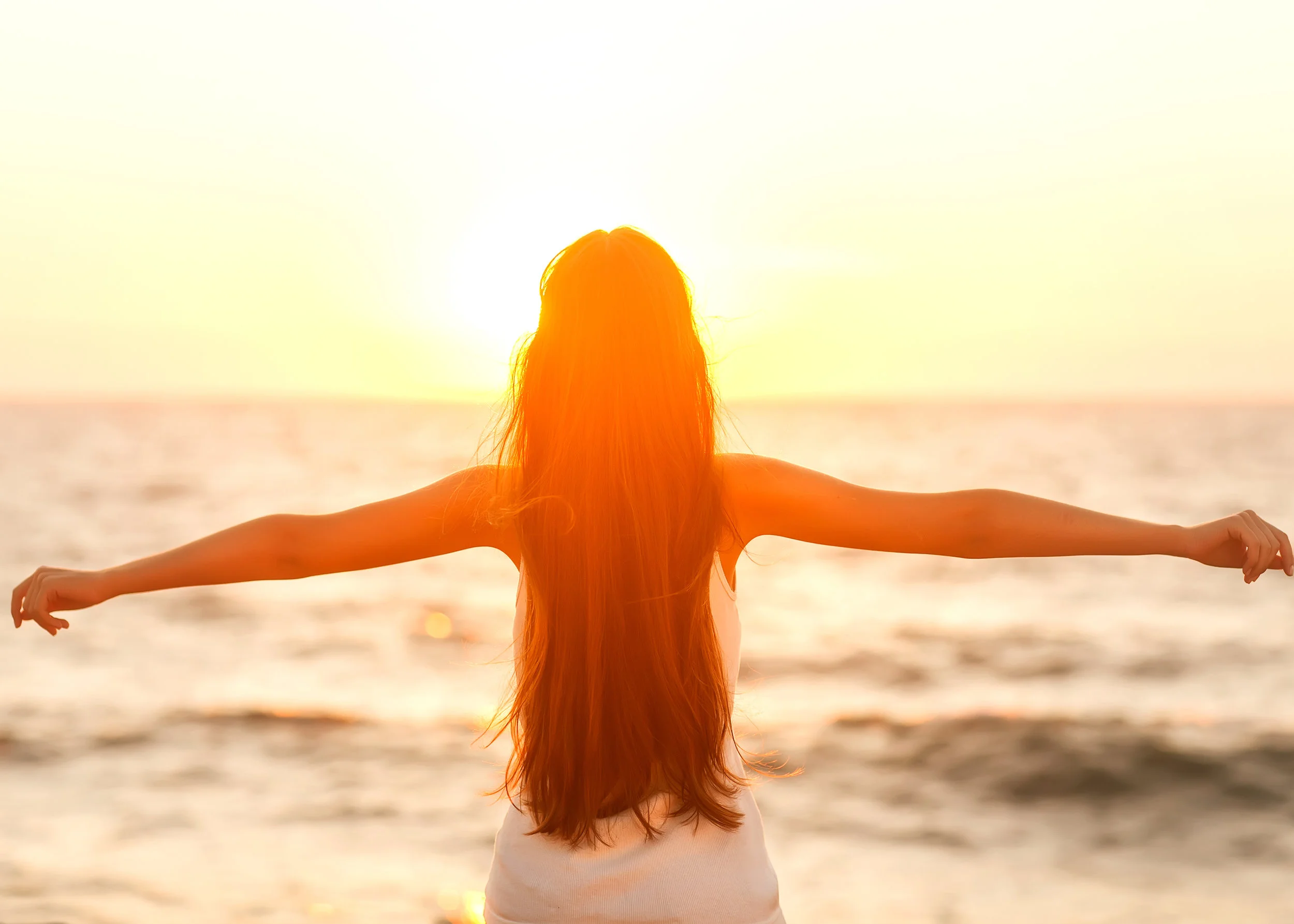 istock- Woman at the beach- Beautifully Fit and Free.jpg