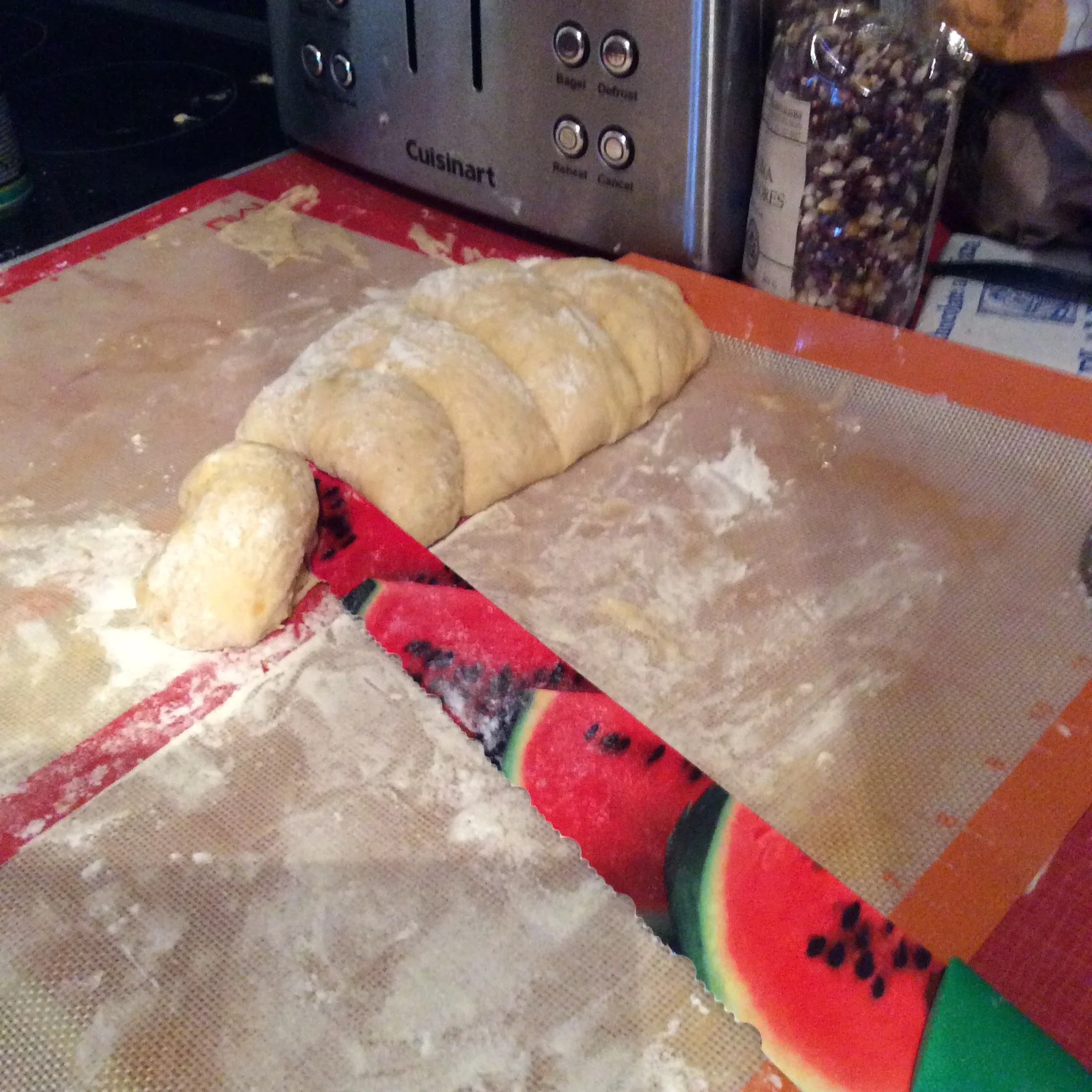 Segmenting the dough. Basically, I included this picture to show off my zany-looking knife. 