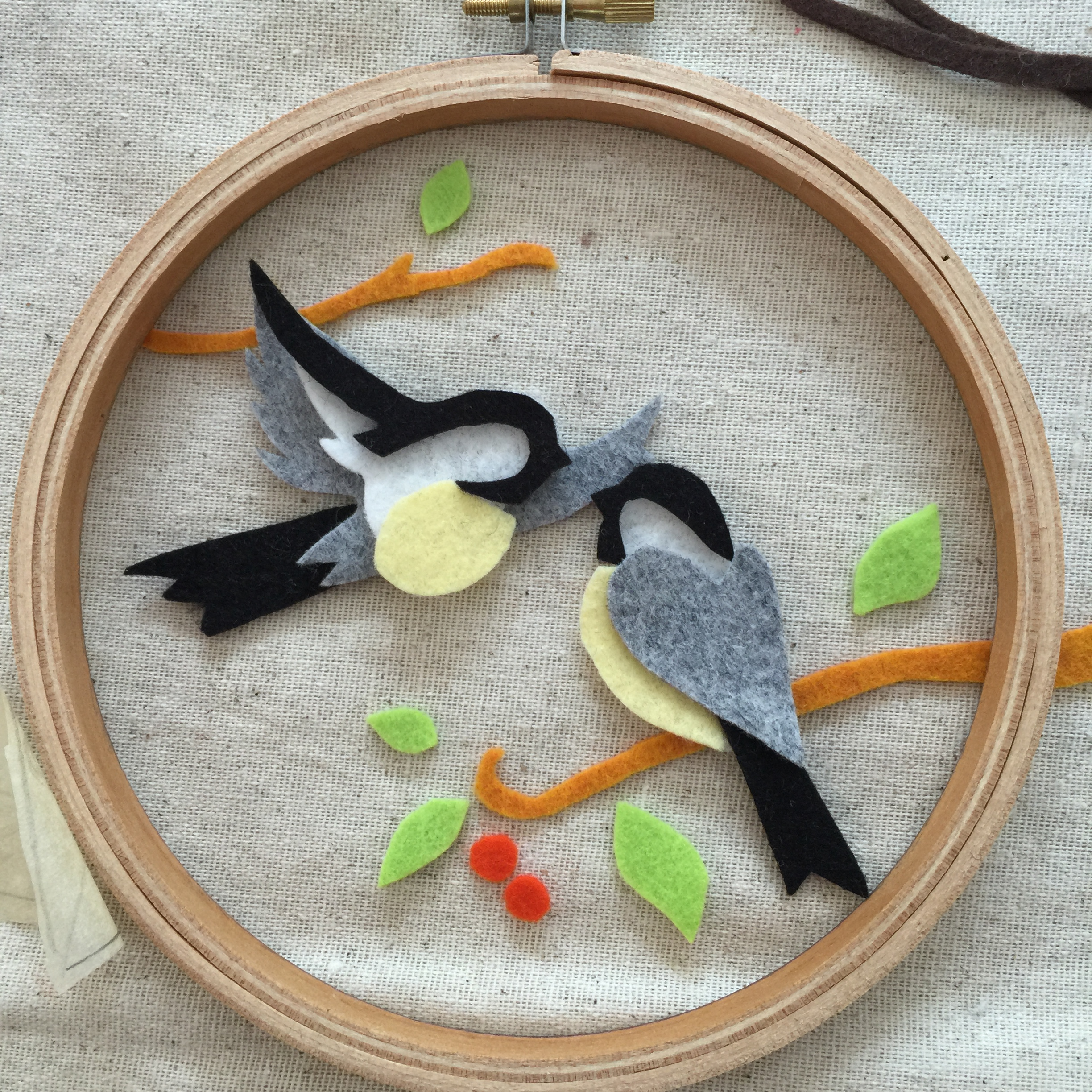 This image shows me test fitting the pattern pieces in the hoop frame.