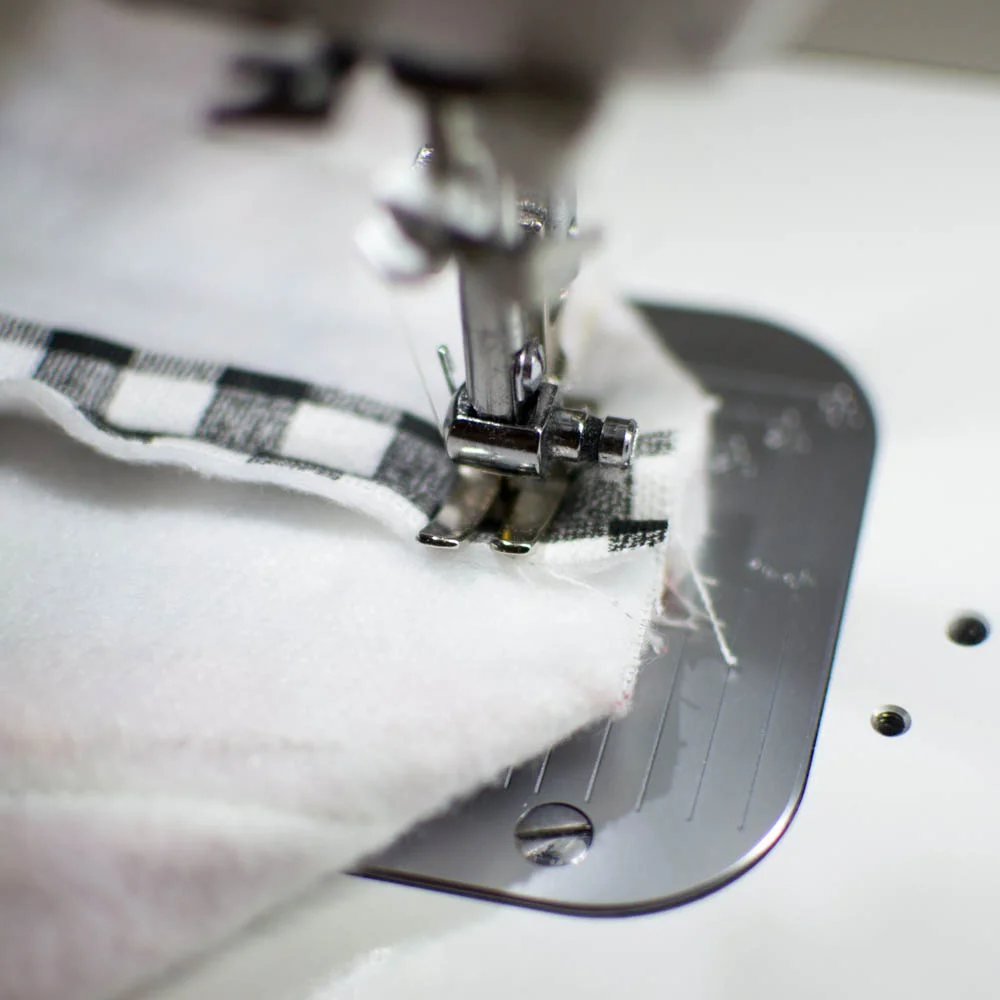 Sewing the other corner that was simply pinned flat.