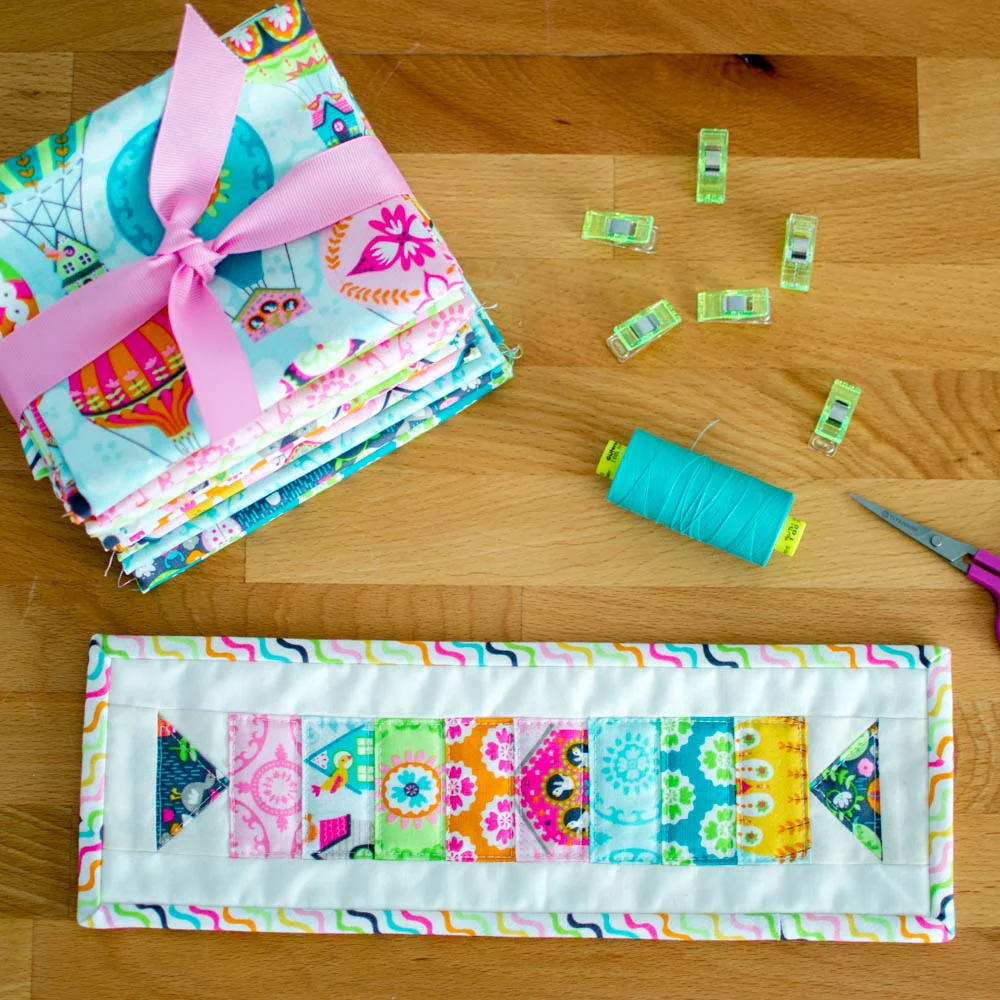 See how I made my cute bias striped binding here .