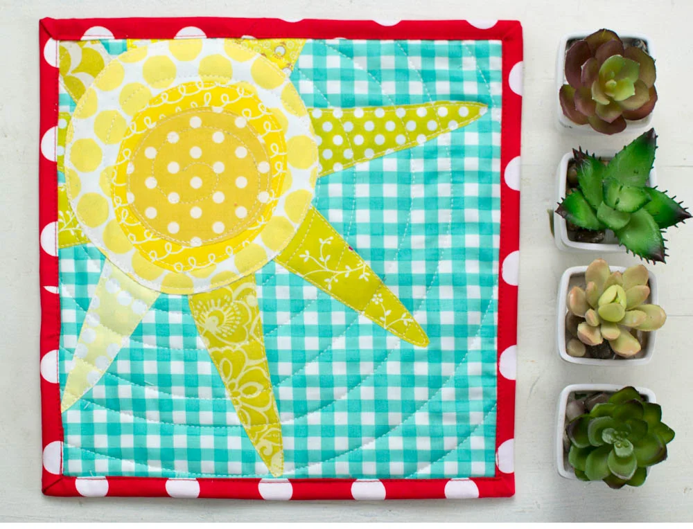 This quilt likes to have plants nearby, don't you think?