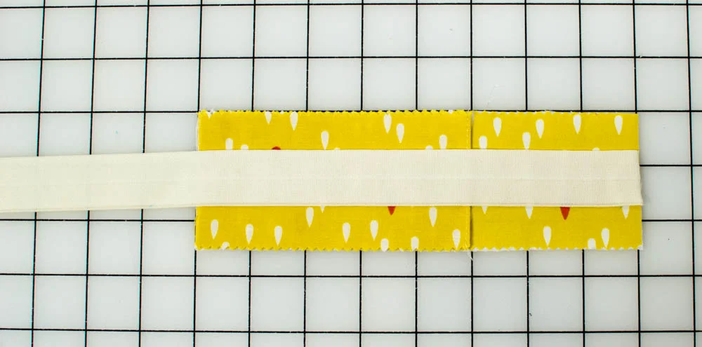 Bottom piece, pocket, and elastic.