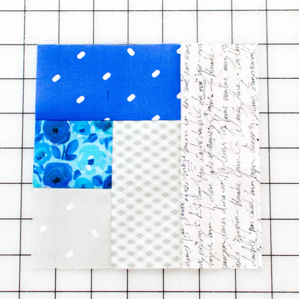 Quilt block unit with fabric 5 added.