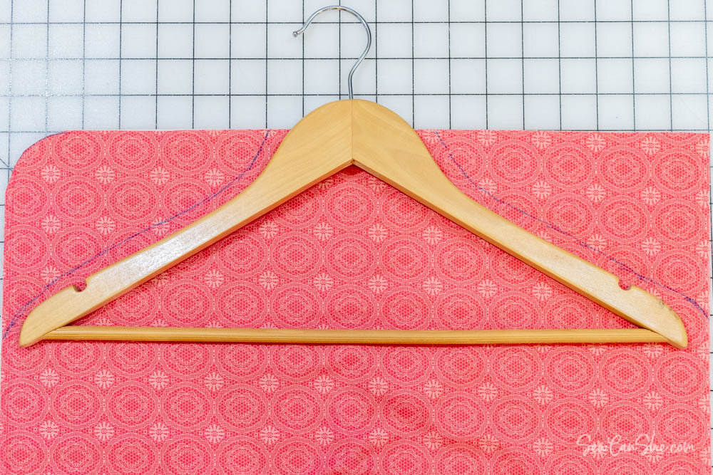mark the shape of the closet organizer at the top