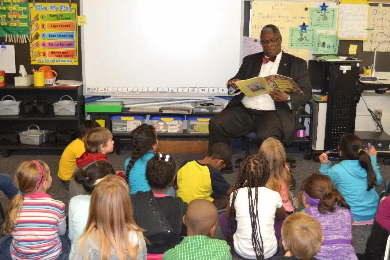 Kansas City, Missouri Mayor Sly James reads to first graders at Martin City K-8 in the Grandview School District.