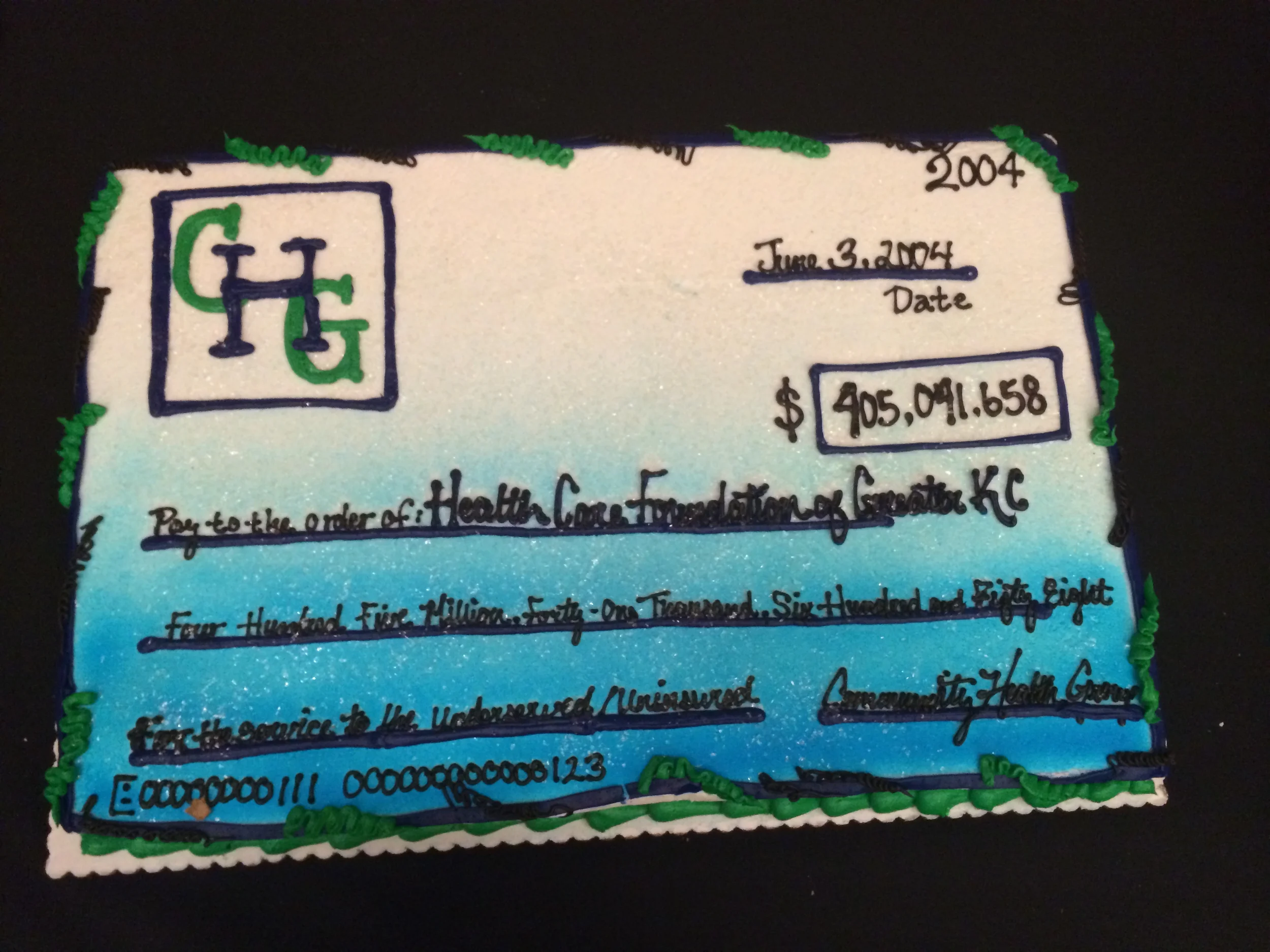 Cake served at a HCF event celebrating its first decade fashioned on the check amount first received in June 2004