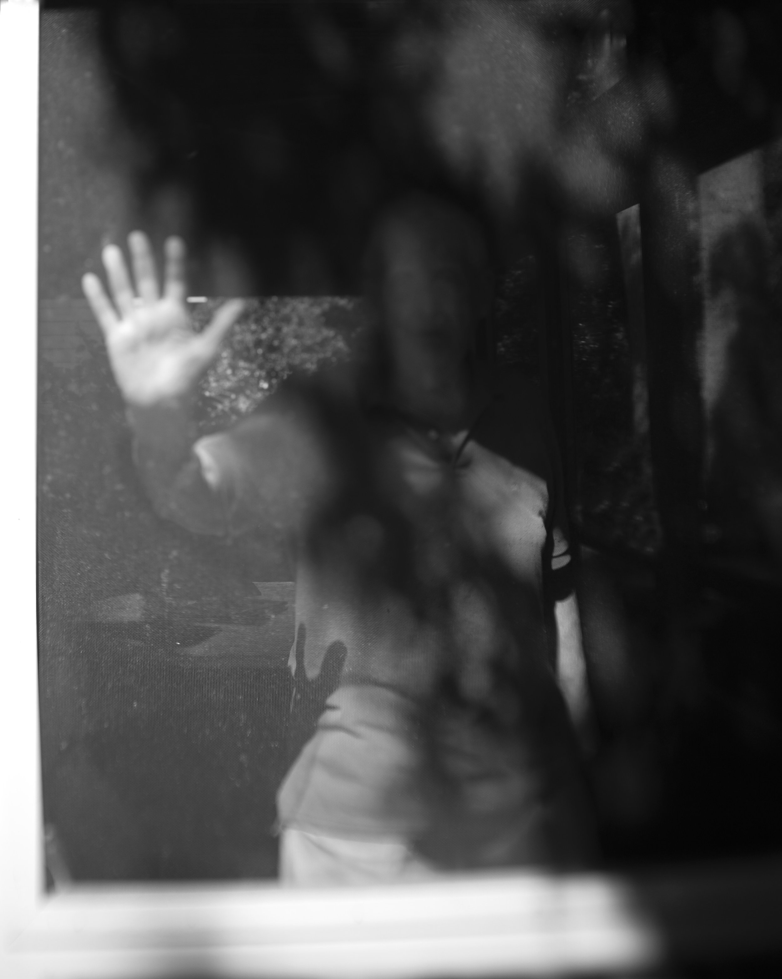 Dad behind screen BW.jpg