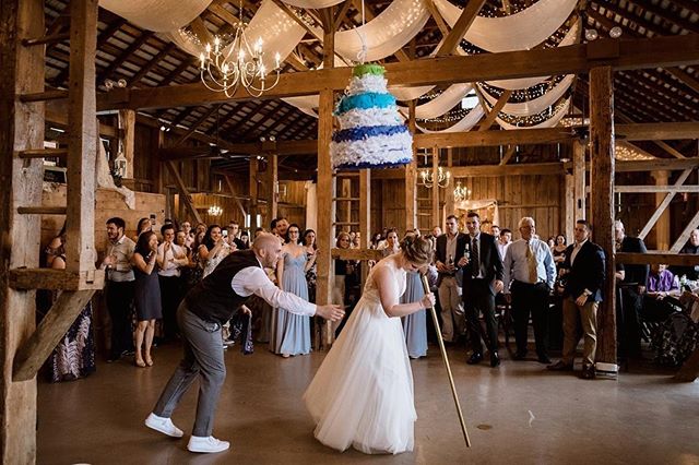 Pi&ntilde;atas replacing cakes at reception needs to happen more often. Such a great way to kick off the dancing, then later on you can wear the scraps as a hat.