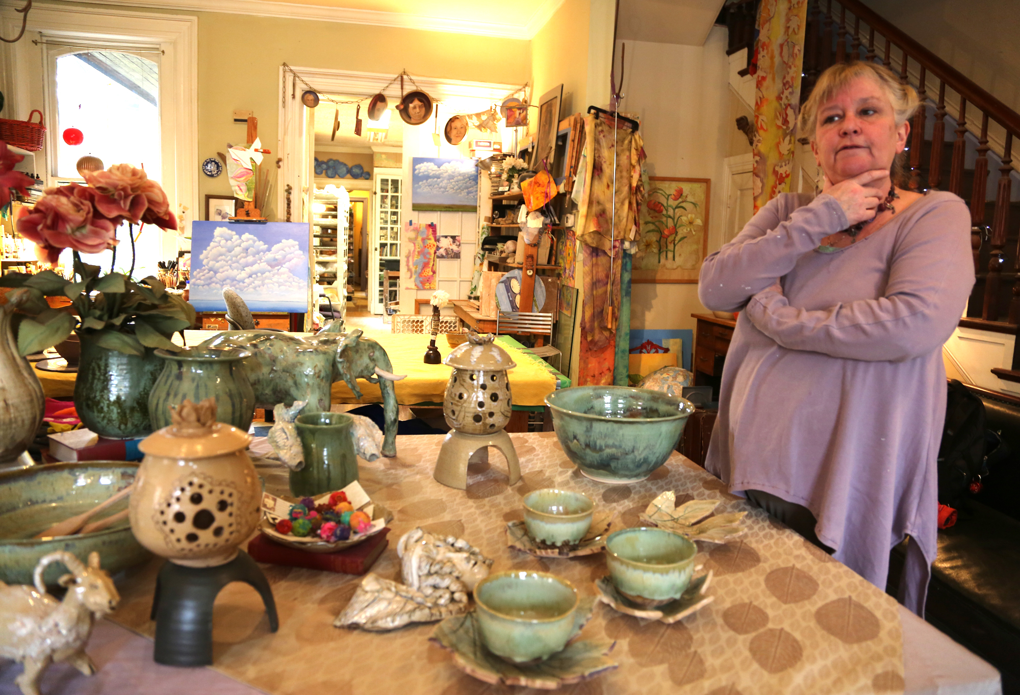 Kim Heindel-Toner, organizer of Artists' Studio Tour: Makers Dozen, stands among her handmade pottery items at her studio and shop Terra Opera Pottery in York. Photo by Sonya Paclob