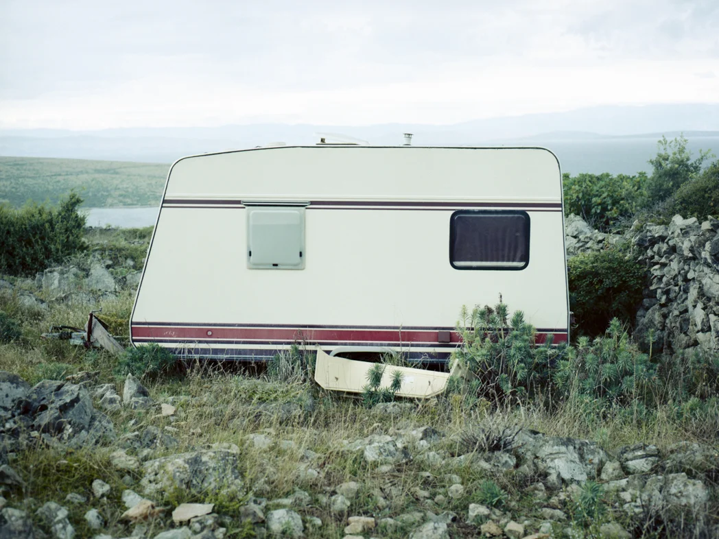 2014 / Analog / Mamiya645AF -ongoing series- Caravans - invented in 1931 by Arist Dethleffs for his wife Fridel Edelmann. She came up with a desire of having something like a gipsy's van for traveling together. Since edification, they're giving humanity the possibility to travel the world while carrying their conversant space. This series tries to give this intimate feel of a "Home Sweet Home" to the viewer and should remind him of his roots. Caravans or mobile homes are a great ability on journeys to trek right home in mind. Closing the gap between homesickness and wanderlust.