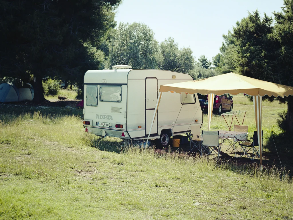2014 / Analog / Mamiya645AF -ongoing series- Caravans - invented in 1931 by Arist Dethleffs for his wife Fridel Edelmann. She came up with a desire of having something like a gipsy's van for traveling together. Since edification, they're giving humanity the possibility to travel the world while carrying their conversant space. This series tries to give this intimate feel of a "Home Sweet Home" to the viewer and should remind him of his roots. Caravans or mobile homes are a great ability on journeys to trek right home in mind. Closing the gap between homesickness and wanderlust.