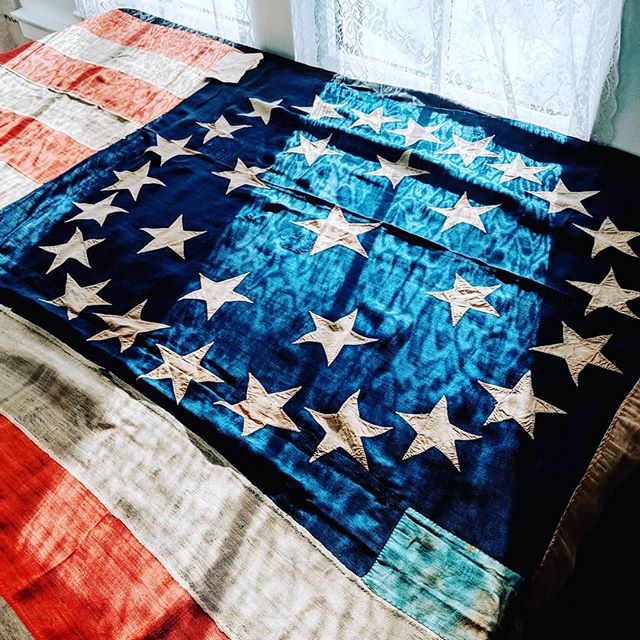 This large 31 star flag was flying on Fourth Street in Cincinnati OH between 1851 and 1861. When we found it in an attic trunk it was folded up and hadn't been touched for decades. The stars are beautifully hand-cut and you feel the quilting that wen