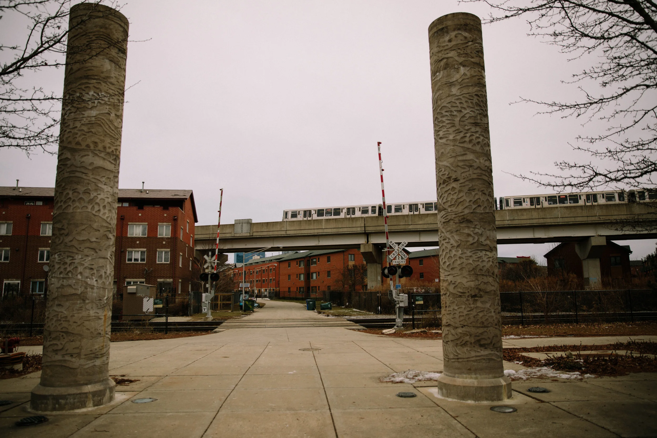 A train moves along the El (elevated line) running through Ping Tom park in Chicago. Chicago is home to MCC partner organization, Parents for Peace and Justice, a support and advocacy organization for families who have lost kids to gun violence in Chicago.