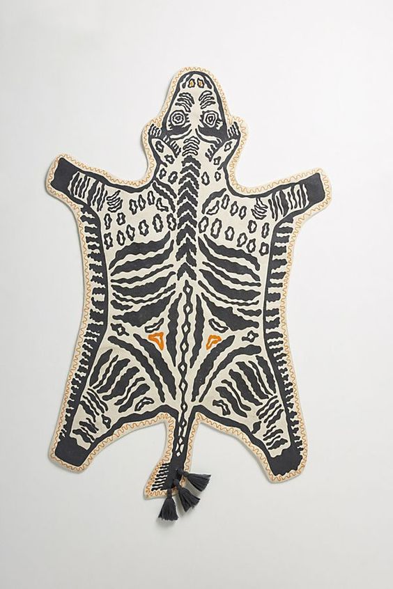 Hand-embroidered safari rug - anthropologie