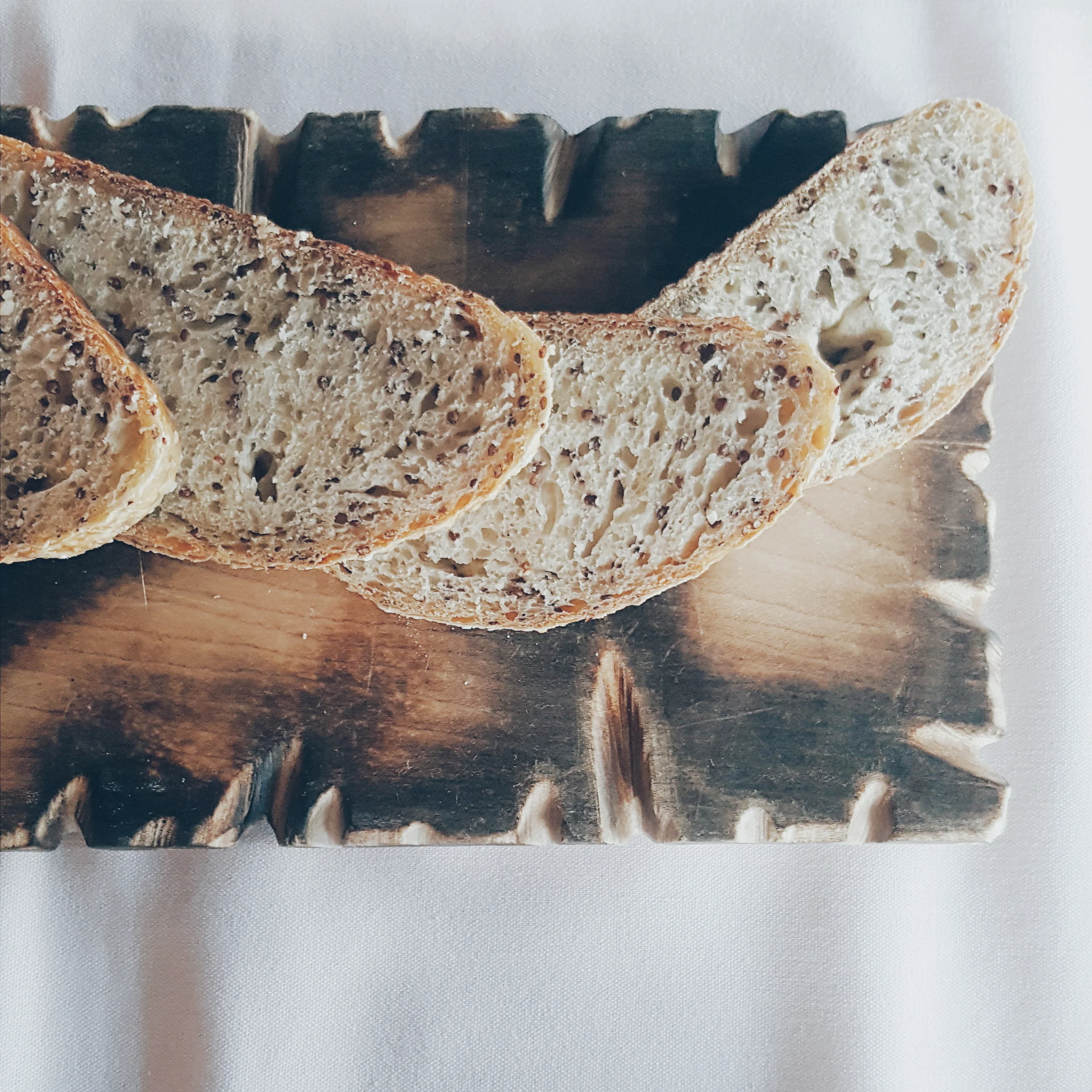 Dylan's Bread with Wild Leek Butter, Rose Cherry Castrique & Douglas Fir Bean Purée.