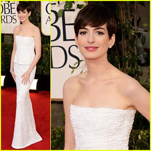 Anne Hathaway: So simple and so classic. Reminds me of Audrey Hepburn. This look never goes out of style. Neutral makeup with a defined brow. And who says that short hair isn't feminine?!? As long as you have a good hair stylist to cut it and complete it with good makeup and wardrobe, it is one of the most stunning looks ever!
