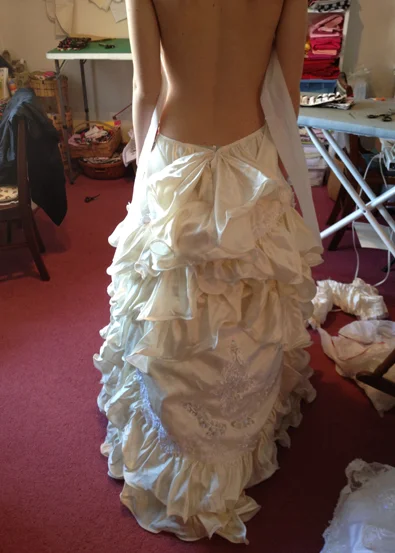 Sleeves off, bottom pinned up, brainstorming top. Not quite feeling it but still seeing potential. Almost there...