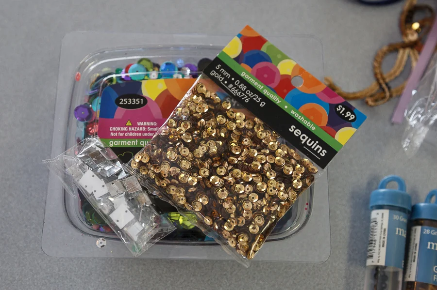 Who doesn't love gold right now?! We got a small pack of gold sequin and a variety pack of sequin that included small to large and a variety of colors.