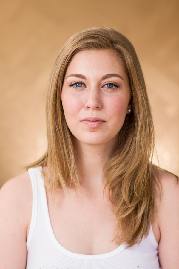 Before starting any upstyle, it is essential the hair has enough product in it to accomplish and maintain a long lasting hair style. If we were to put hair on a scale from 0, being the softest, most pliable hair to a level 10, being unruly with no pliability, we want the hair to be a level 7. Our model Elizabeth had clean, dry, level 5 hair before we began. To bring her to a level 7, I would use Aquage Sea Extend Volumizing Shampoo & Conditioner to wash, Uplifting Foam to blow her hair out from wet to dry, and Beyond Body to iron her hair out straight or add curls. Now her hair is ready for an undo. I cannot stress enough how important these "prepping steps" are. Throughout every step of styling, I constantly spray the hair with Biomega Firm & Fabulous Hairspray from 8-10 inches away to add hold and control flyways. 