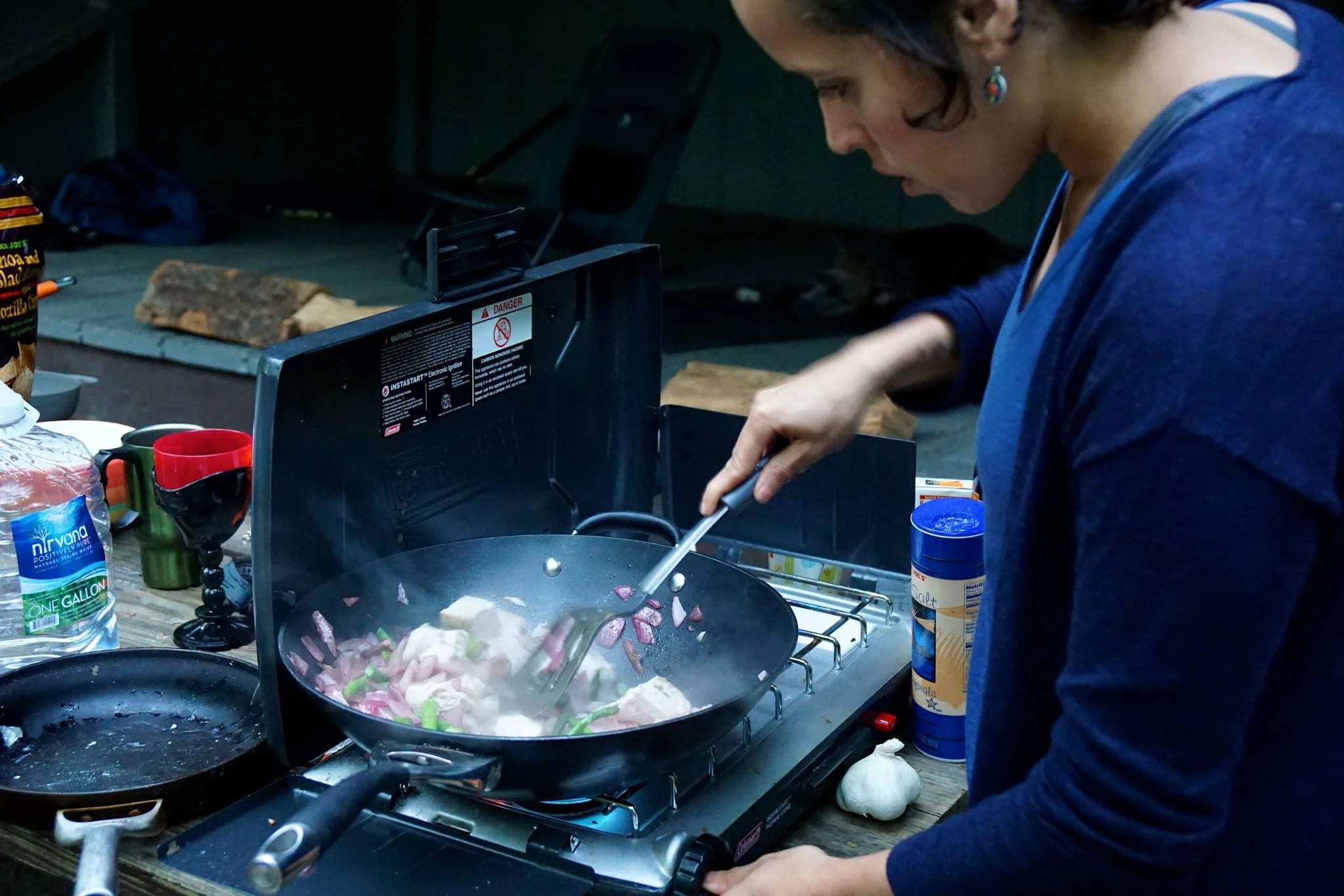 Elizabeth cooking up some good fuel for the adventure ahead