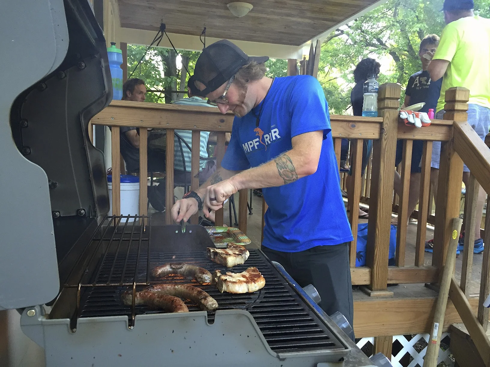 Teammate Scotie Jacobs tending the barbecue.