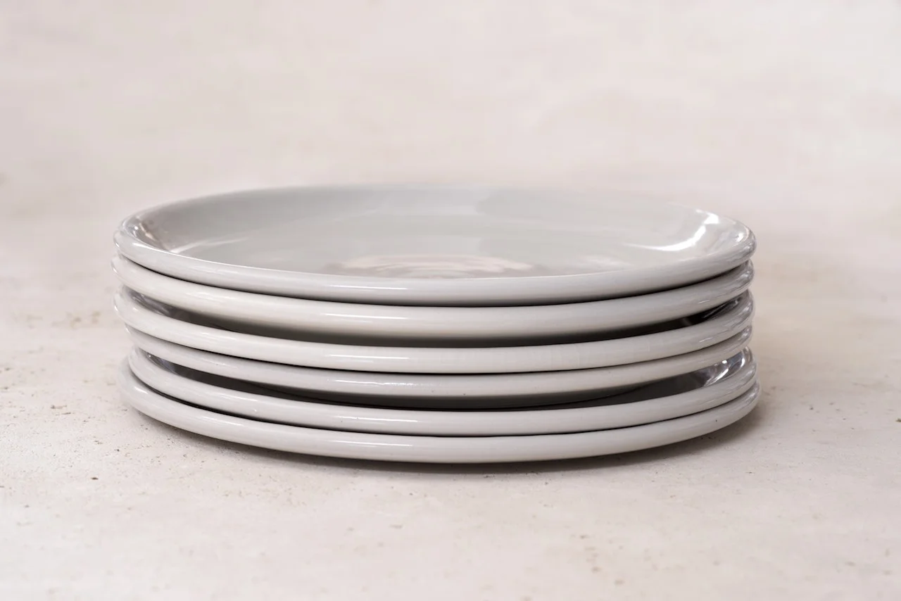 IrvingPlaceStudio_DinnerPlateStackPlainBG_Porcelain.jpg