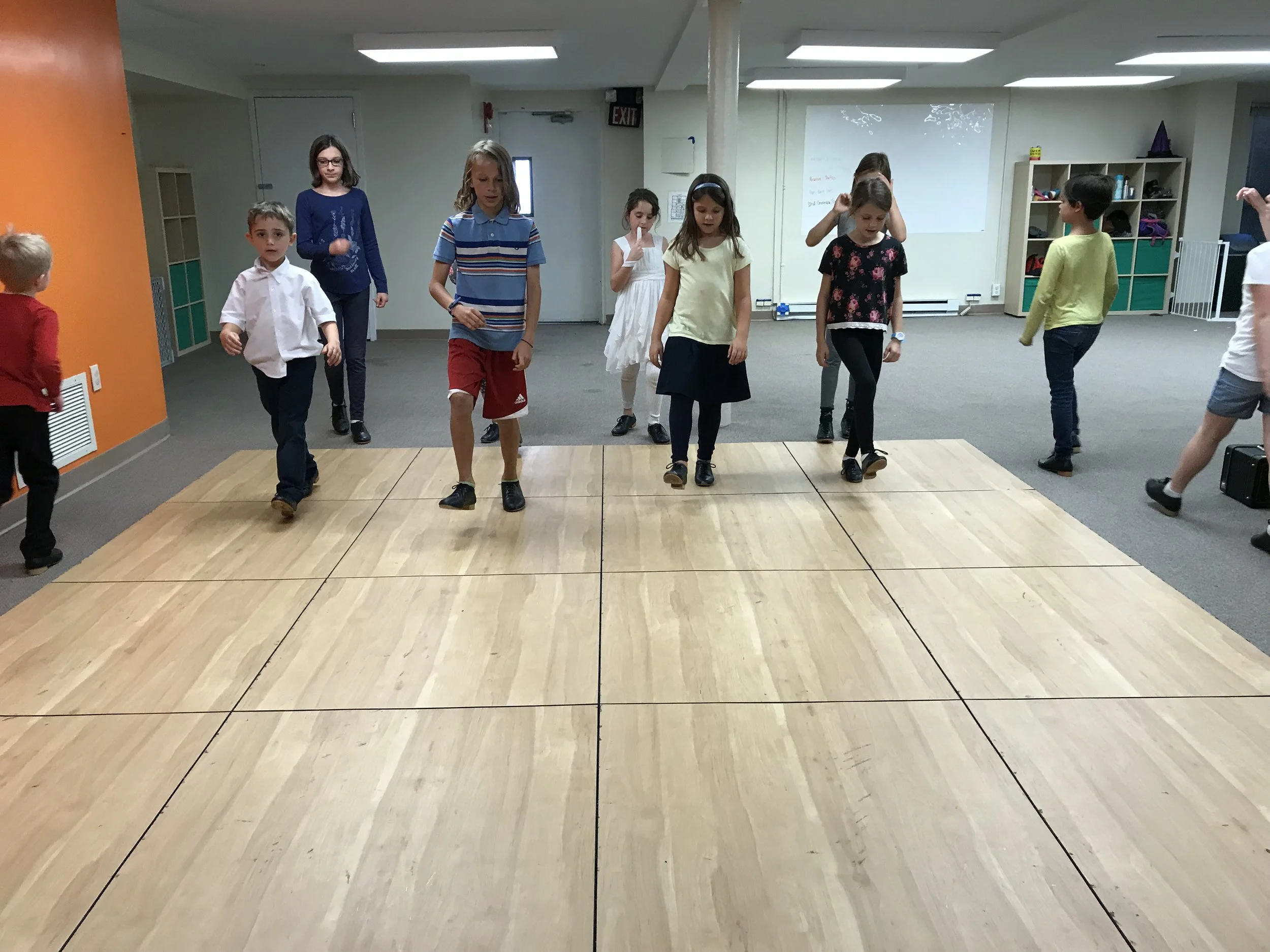 We have been including "across the floor" time as part of our warmup, working on executing our steps in time with each other. We do "dee dum" patterns, including the Connemara basic (forward and back), and the "Snoopy Shuffle" 