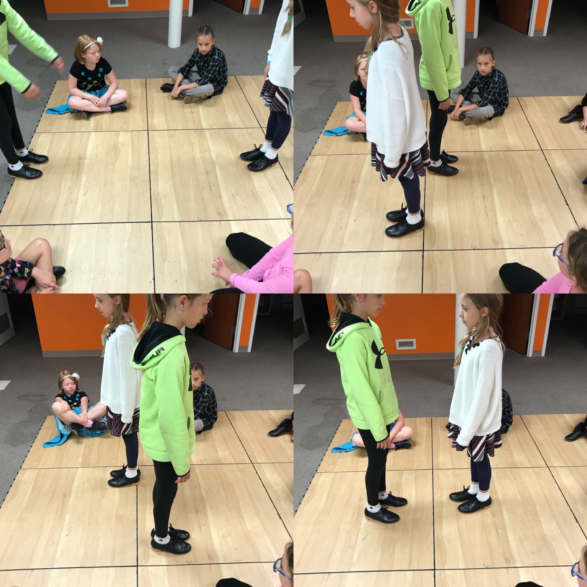 It's handy that we have these squares on the floor! It gives us a great guideline for where in the "set" the dancers need to be, and also allows us to practice certain moves in pairs, rather than needing to wait for all 8 dancers to take a turn! Here, Willa and Eva are showing the kids where they need to land every 2 bars of music. This means the children will need to listen and dance, but they also get to work with another person in doing that. 