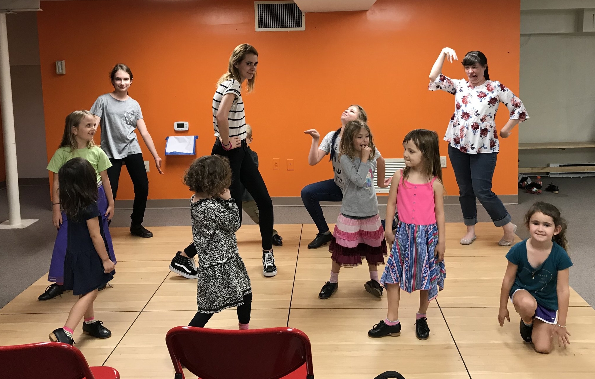 Sometimes the big girls come and join us at the end too! Here we are playing the Statue Game, where one child dances and the rest are statues. Then the child makes the same shape as someone and that person gets to be the dancer. This builds musical understanding, body awareness, and helps the children feel part of a bigger community!
