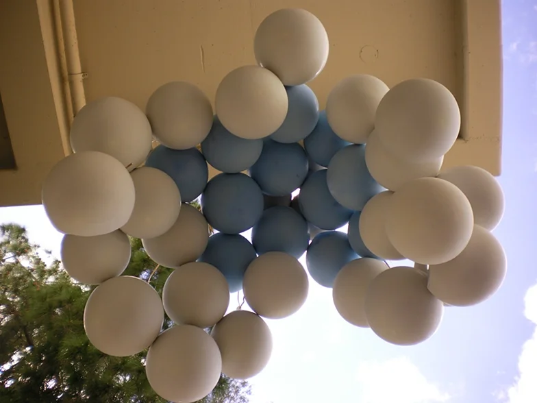Biliousness, 2011 6’ x 5’ x 12’ Plaster, Balloons, Mono-filament, Mirror