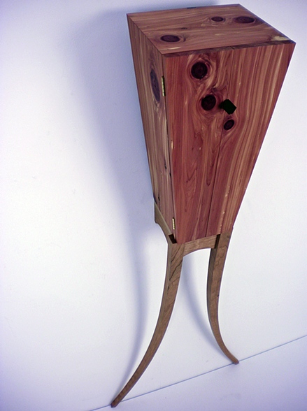    Vertigo Cabinet , 2010  

 18’’ x 13’’ x 43’’ 

 Aromatic Cedar, Cherry, Rubber&nbsp; 