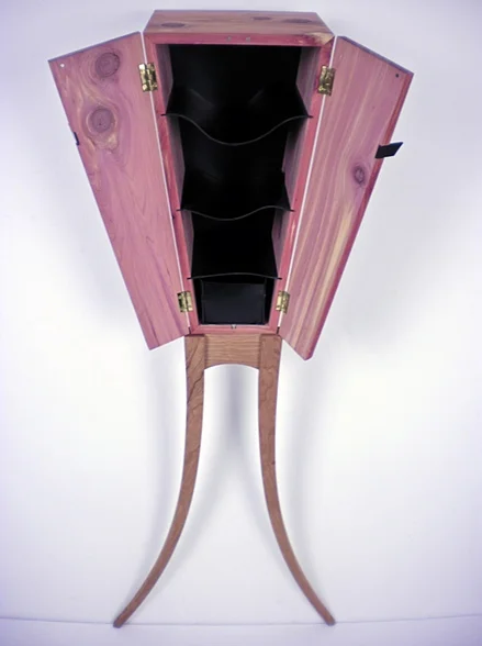 Vertigo Cabinet , 2010 18’’ x 13’’ x 43’’ Aromatic Cedar, Cherry, Rubber 