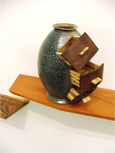 Vase with Drawers, 2009
6 ½’’ x 5 ¼’’ x 7 ¾’’
Wenge, Spalted Maple, Stoneware Cone 10 Salt Fire, Sprayed Glaze