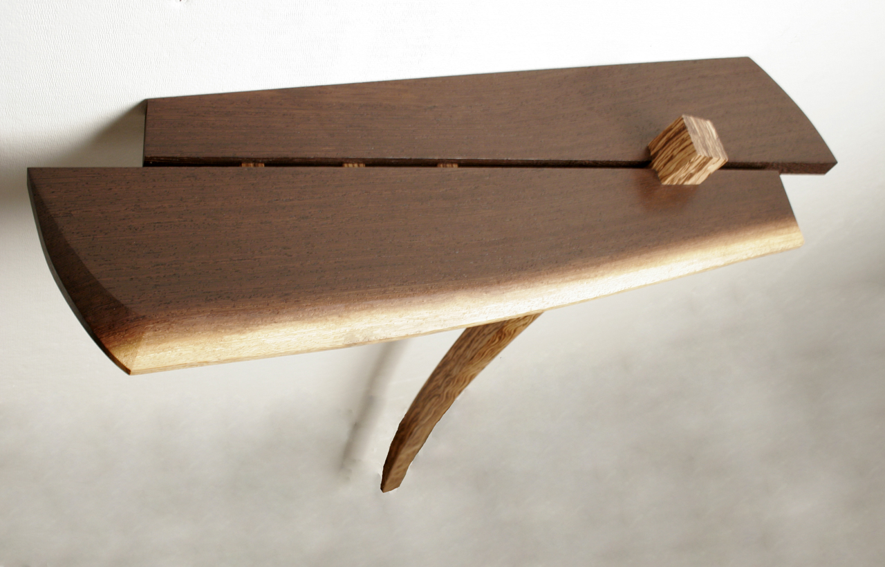    Wenge Console Table,  2009  

 29’’ x 8 ½’’ x 32 ½’’  

 Wenge, Poplar with curly Zebrawood veneer 