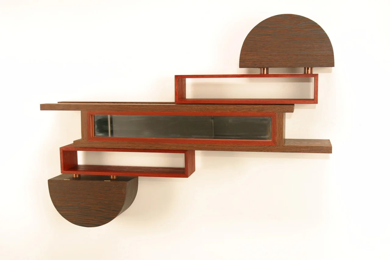 Sliding Dovetail Mirror/Cabinet, 2007
36’’ x 6’’ x 24’’
Wenge, Paduak, Wenge Veneer
