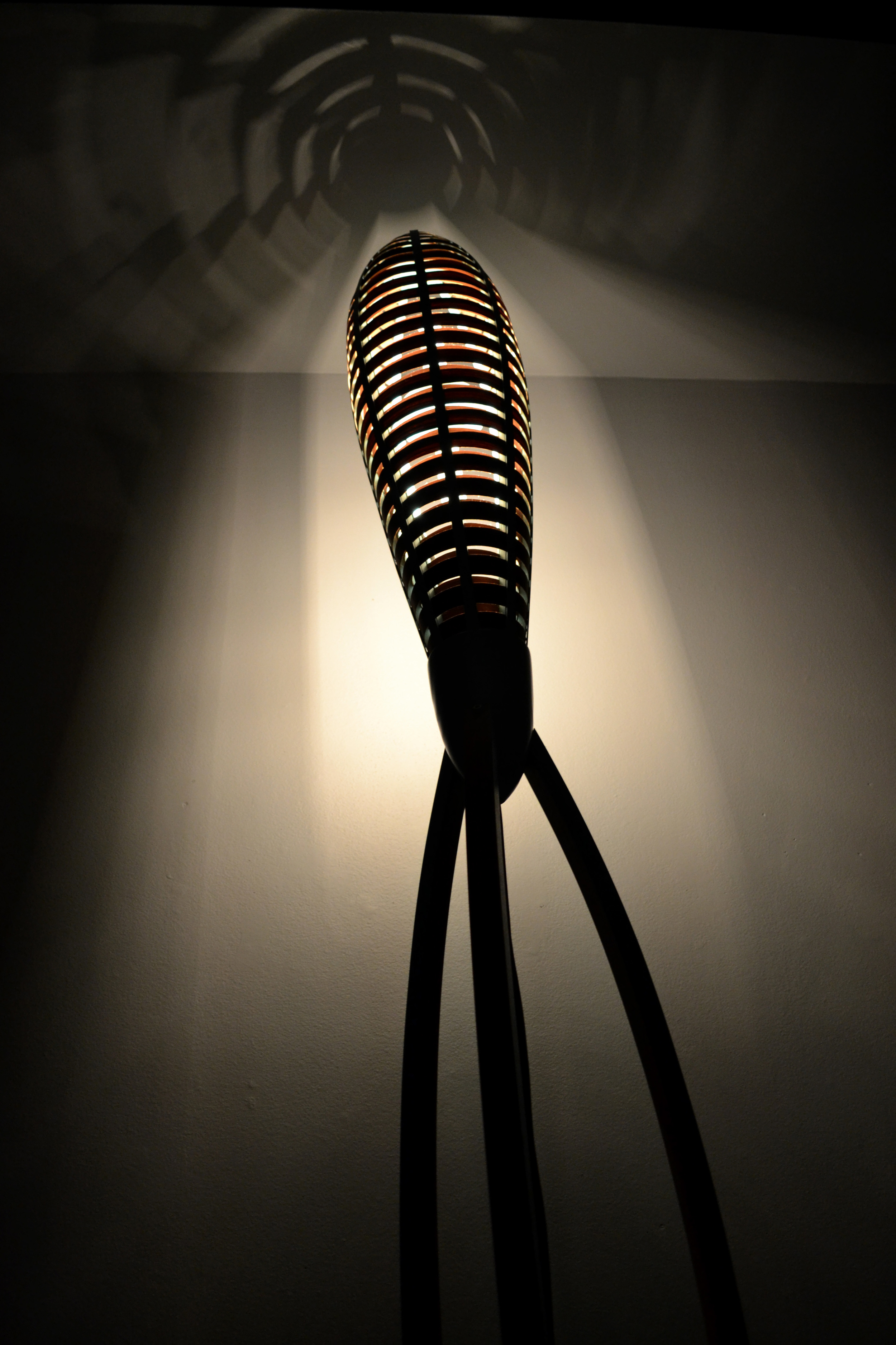    Tsiolkovsky Lamp, 2013    ​ 2 1/2' x 2 1/2' x 8'​    Walnut Veneer, Poplar, Paint  