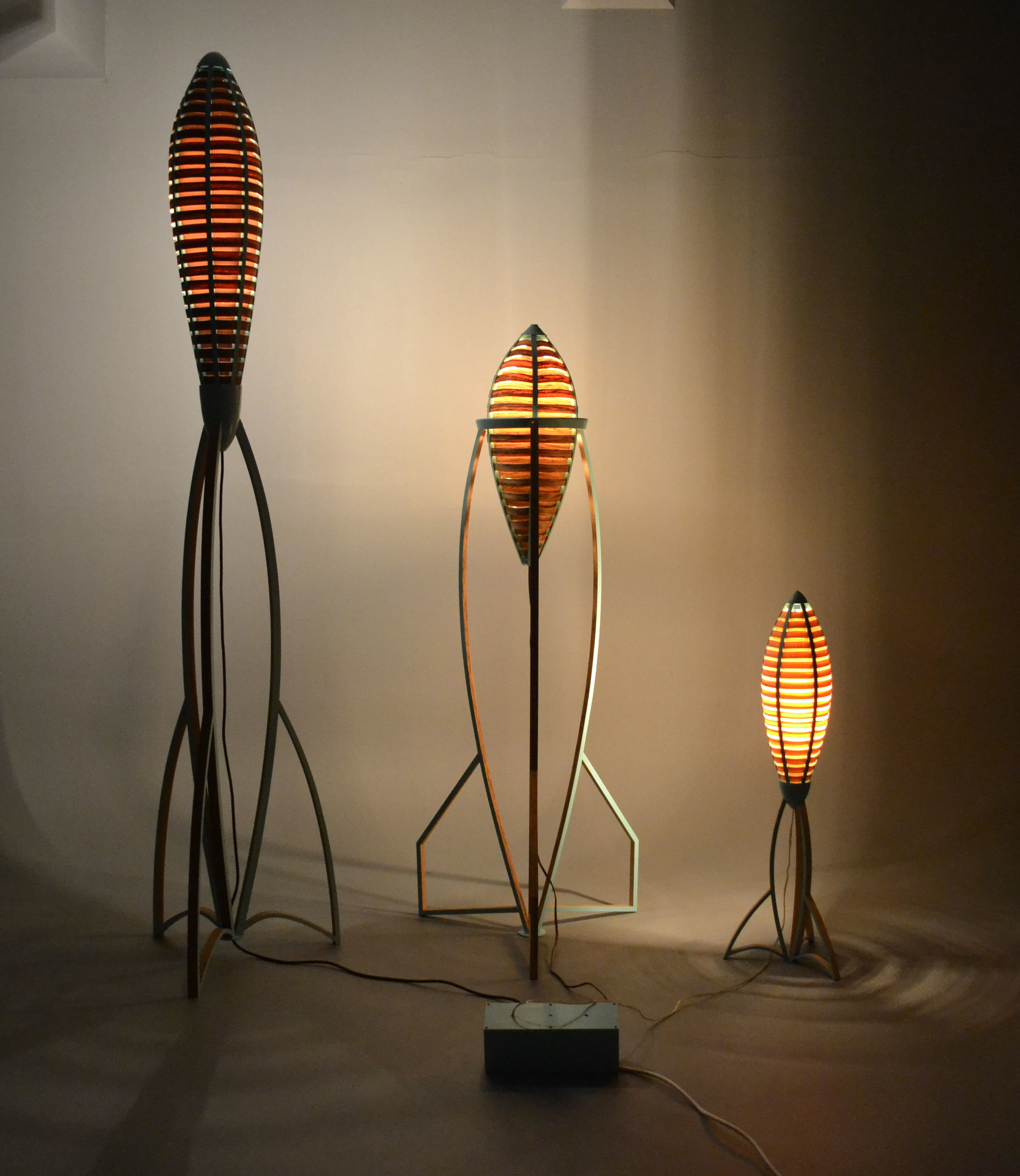  ​    Tsiolkovsky Lamp Series  , 2013      8' - 3' Range  Veneer, Poplar, Paint  ​ Photographed by Ryan Gray  