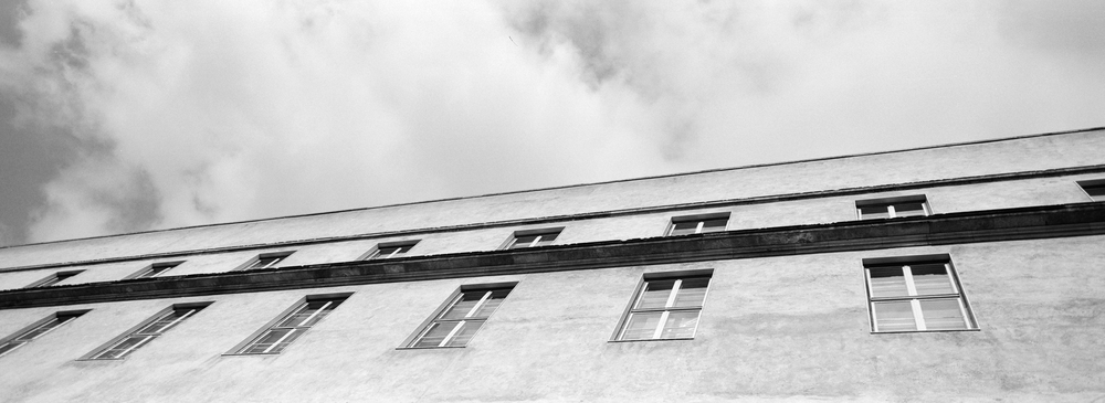  Needed to test my newly purchased Hasselblad XPan camera. So Hjalte and I went outside and searched for good motives. The strange Københavns Politi building, just around the corner, was the very first shot. It is a simple image, almost boring, but s