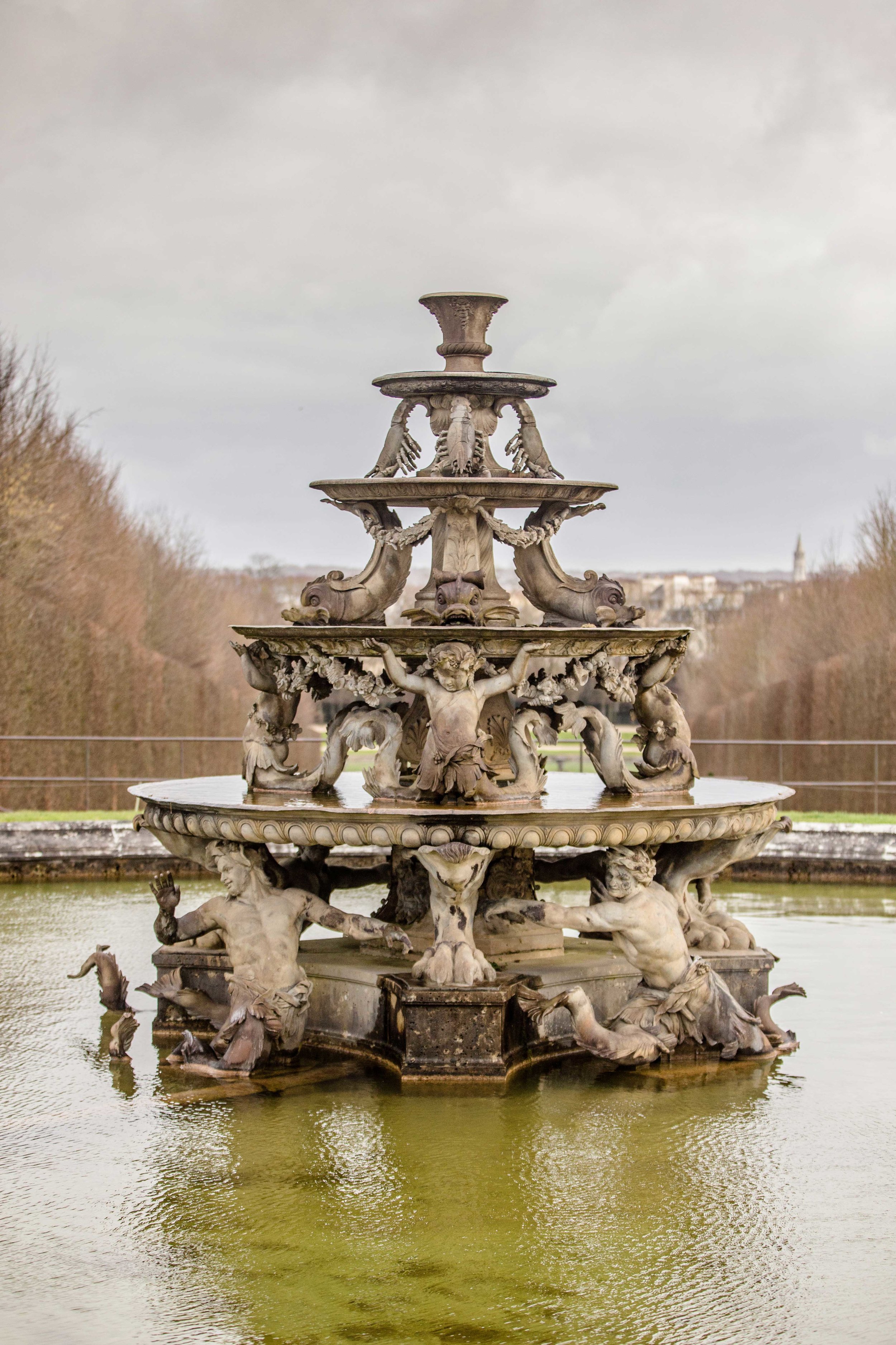 One of the fountains in the gardens of Versailles
