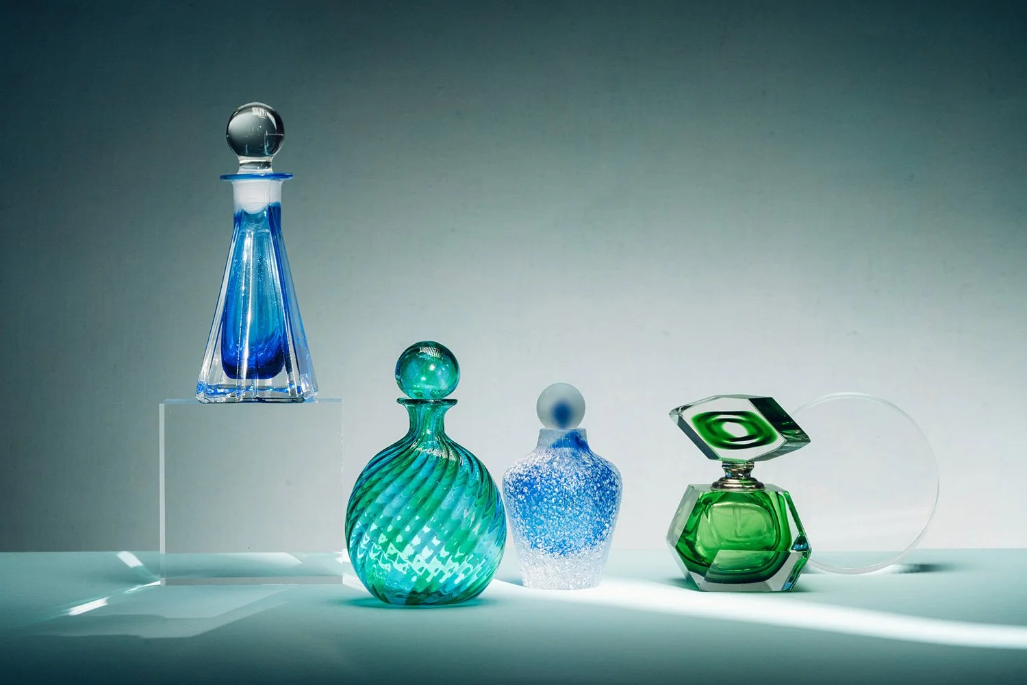 Perfume bottles photographed in the studio with interesting colours and shapes