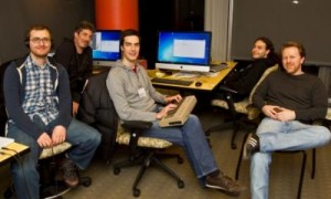 L eft to right: Arshan Gailus (Music), Elliott Mitchell (Art), Ethan Fenn (Programming), Gregory Kinneman (Programming), Jonathon Myers (Design and Writing), and (not pictured) Courtney Stanton (Producer).