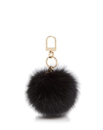 One of these furry little bag charms. $95 at tory burch