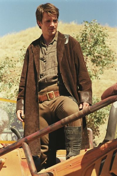 Mal's "browncoat" is a symbolic rejection of Alliance culture.