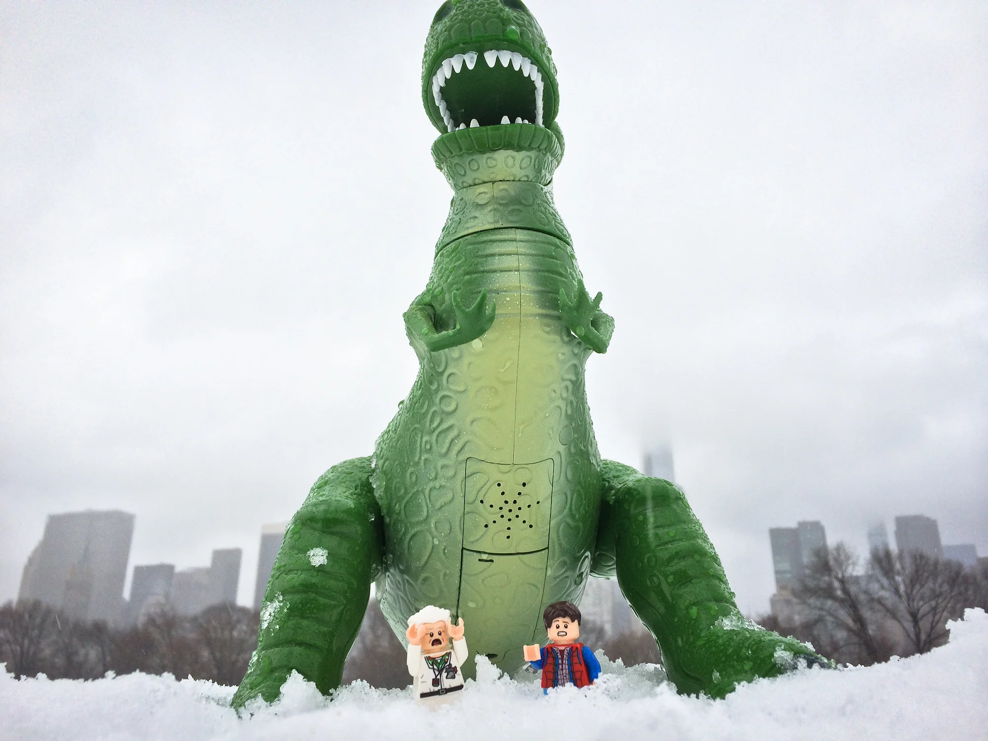 Back to the Future lego Marty McFly and Dr. Emmett Brown with Toy Story Rex in New York City snow. 