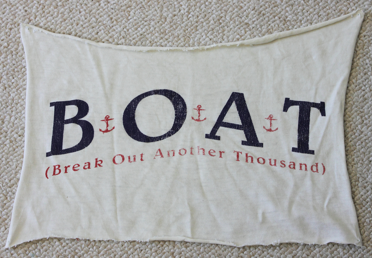 What is left of the BOAT shirt.