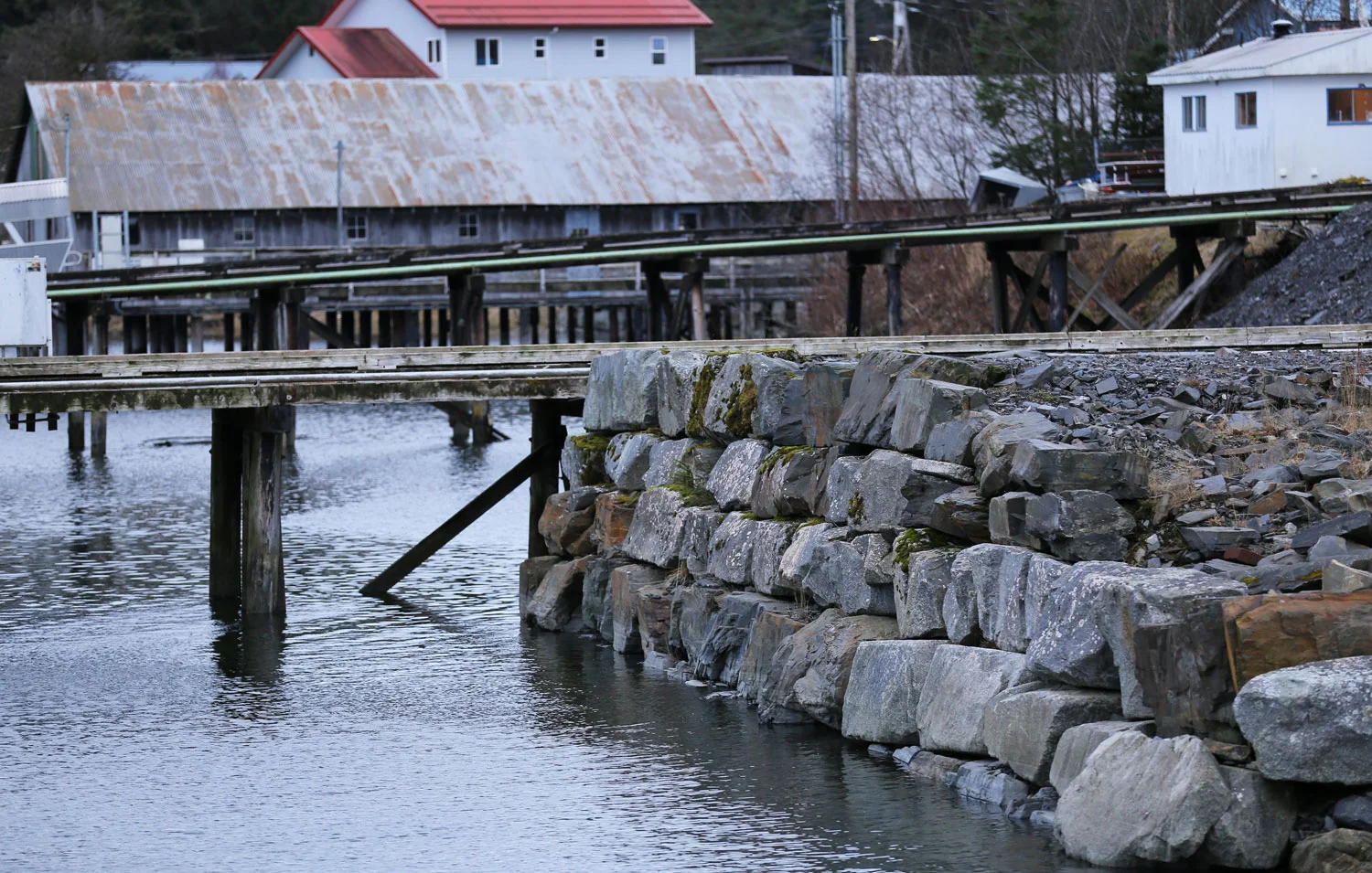 Stone sea wall in Wrangell Harbor.