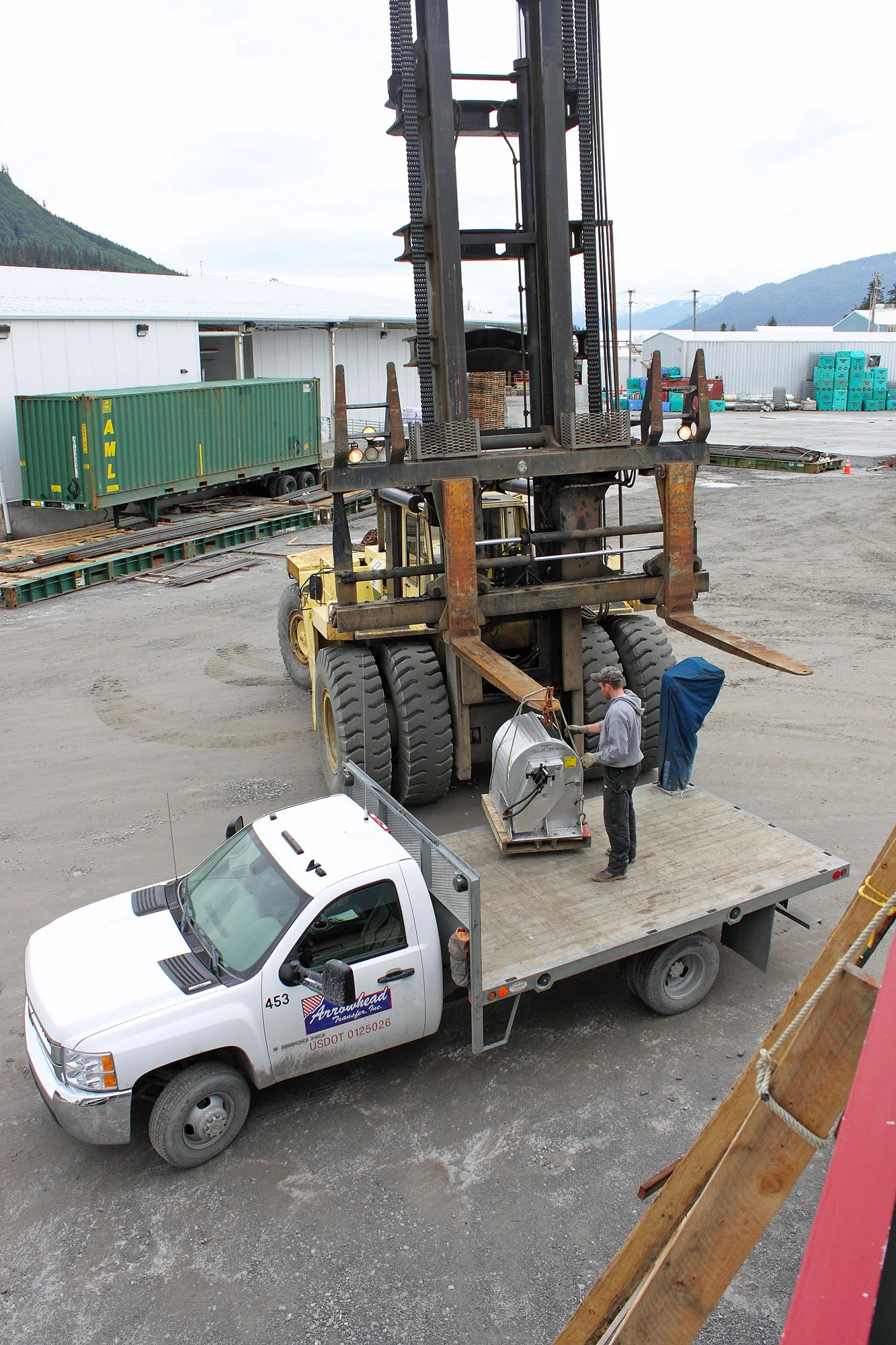 The anchor winch being delivered to the boat in the boatyard.