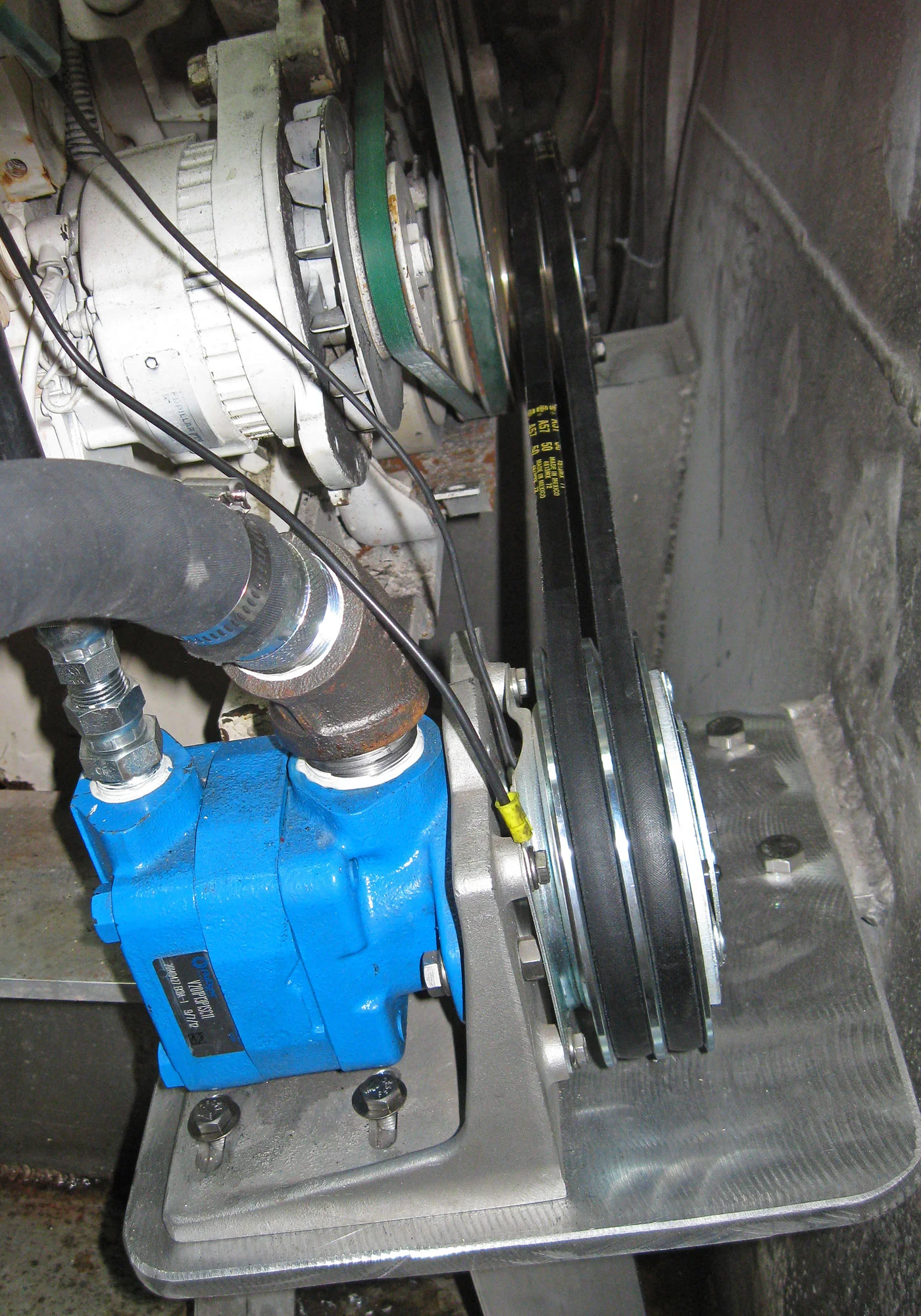 Harley folded himself into this corner of the boat to install the hydraulic pump.
